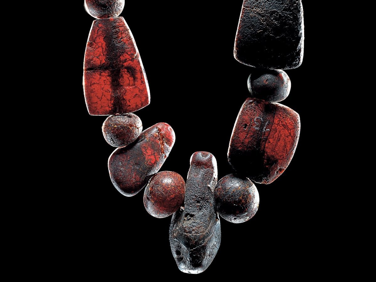 The remnants of a necklace of amber beads from Dieskau hoard II. © State Office for Heritage Management and Archaeology Saxony-Anhalt, Juraj Lipták.